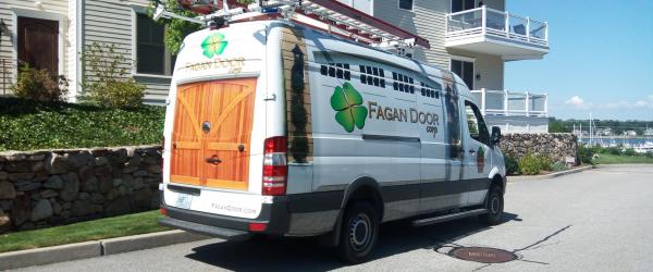 Clearly lettered Fagan Door vehicle with Signature 4-Leaf Clover