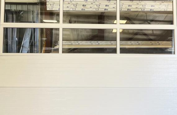 white door with two rows of full vision windows