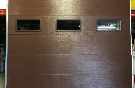 brown door with 1 row of windows